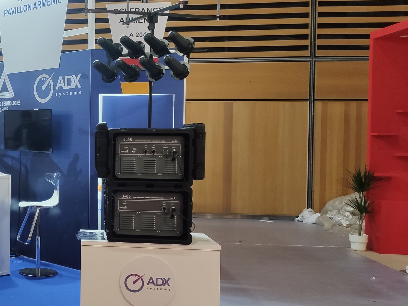 ADX Systems stand showing the J-05 on display